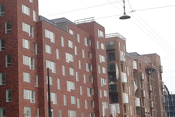 RUSTIKOTTA Fjeldpanel® C2 pryder facaden på nyt boligkvarter i Københavns Sydhavn